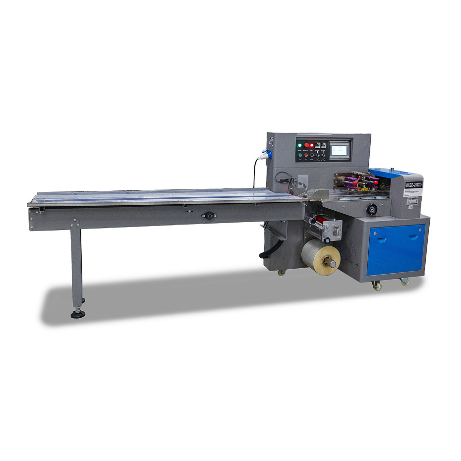 Горизонтальная упаковочная машина Hualian Machinery DXDZ-250XD с нижней подачей пленки (3 сервопривода. лент. 100 мм, рег.форм., мин. пакет Д-65 мм, В-40 мм, 2-х позиц.нож)